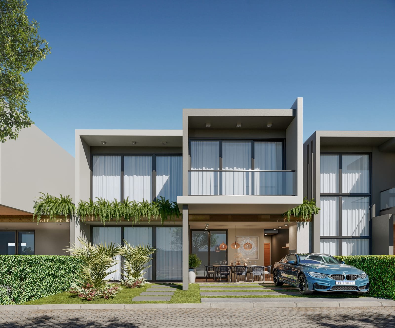 Le Jardin — Fachada de uma das casas, com painel de madeira e vegetação nas sacadas.